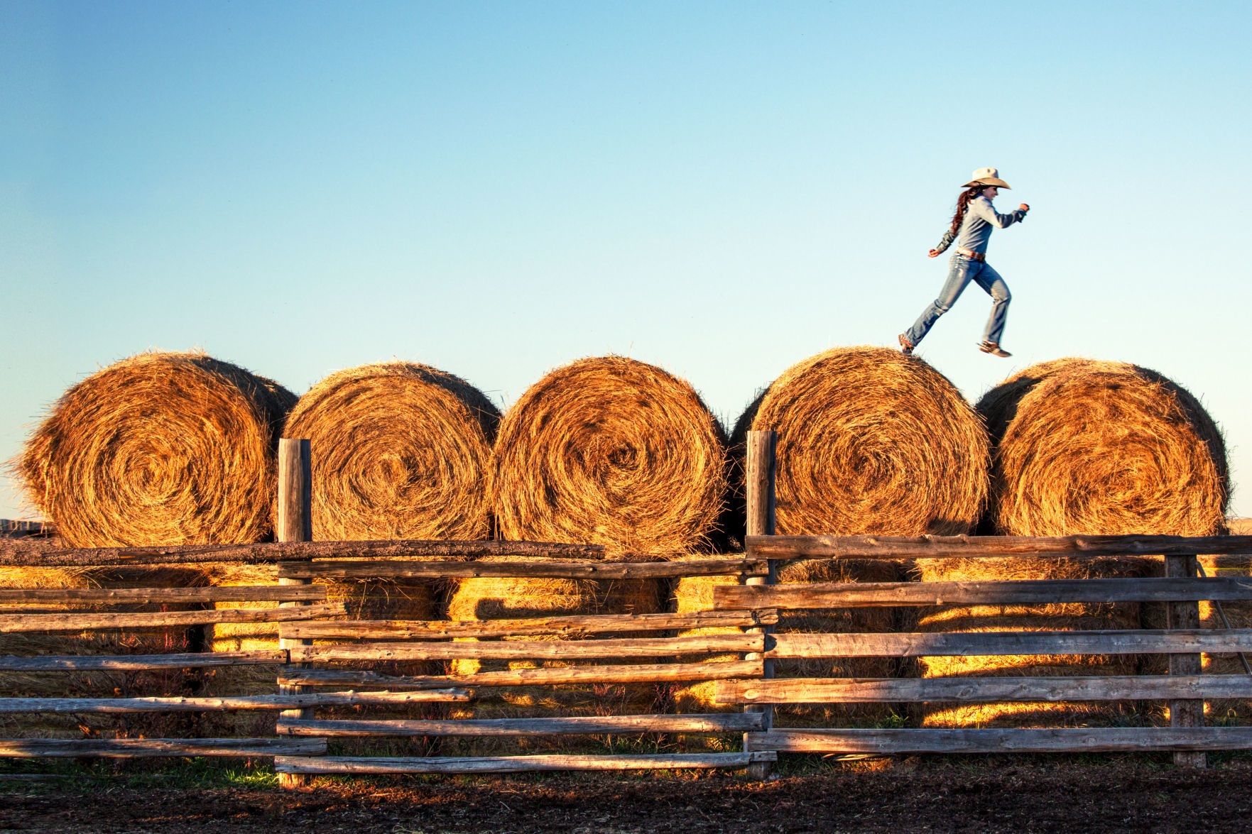 Leaping over bales